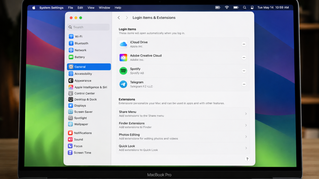 macOS System Settings open on Login Items and Extensions panel to manage startup apps